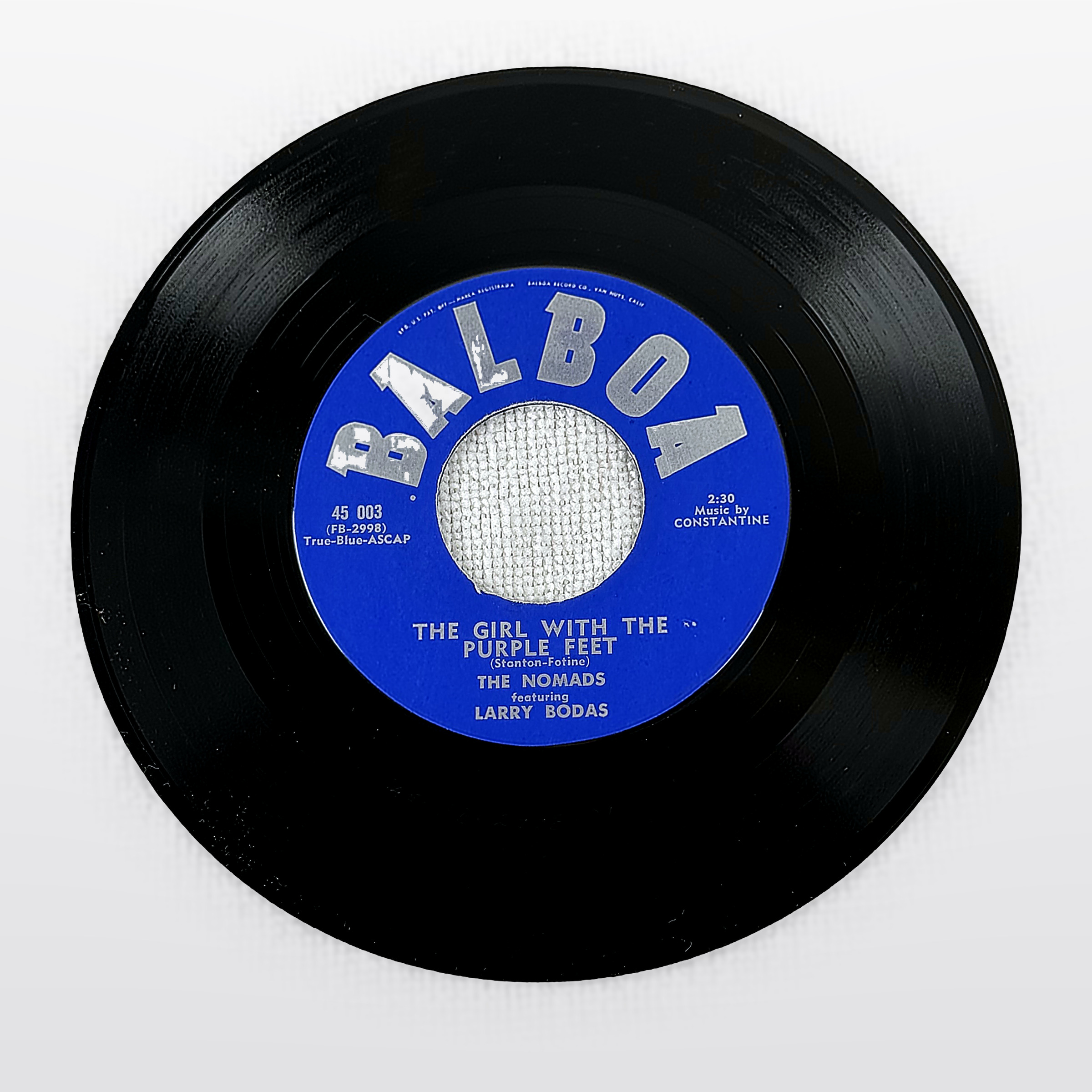 The Nomads Featuring Larry Bodas The Girl With The Purple Feet / 7" Vinyl Single